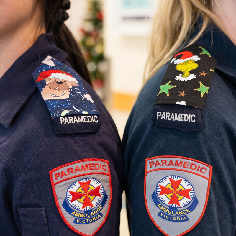Christmas epaulettes on 2 paramedic shoulders