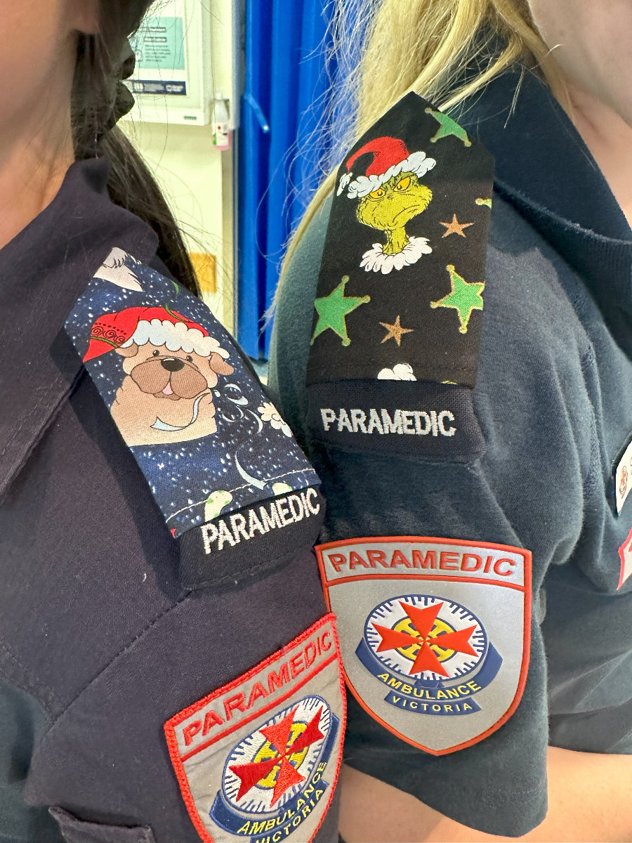 Dog & Grinch christmas epaulettes on shoulders