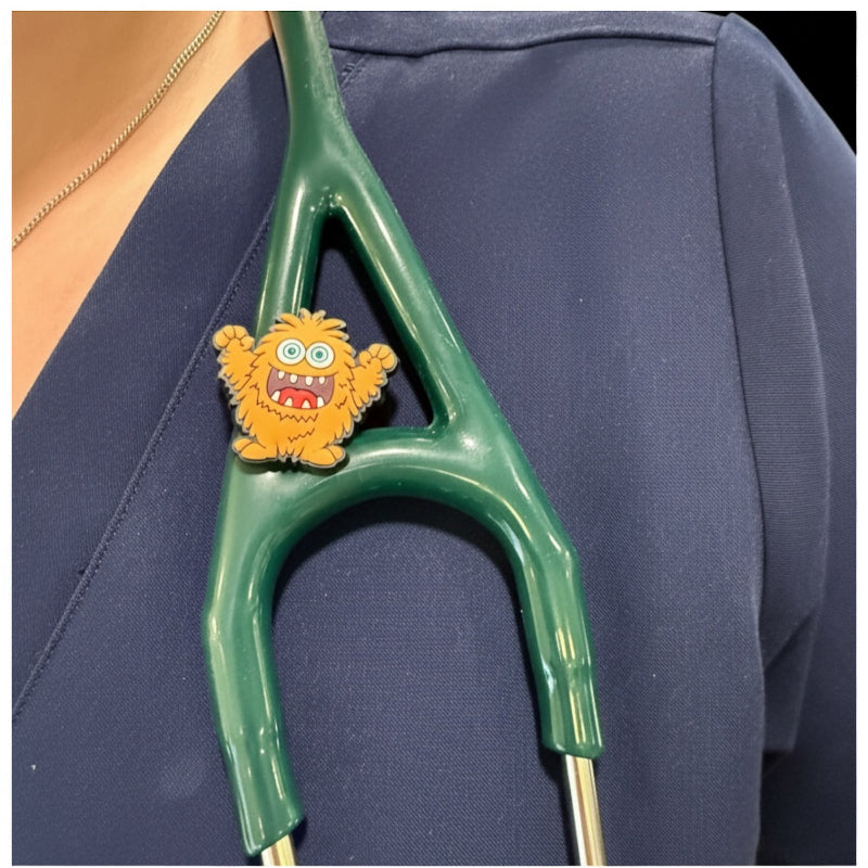 Orange Monster on nurse stethocharm